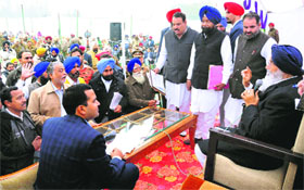 Punjab Chief Minister Prakash Singh Badal holds a Sangat Darshan programme in Bathinda district on Thursday.
