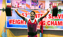 A player in action during the 57th Inter-Services Weightlifting Championship on Thursday