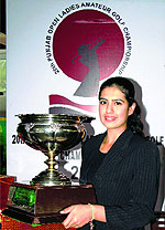 Tavleen Batra with the trophy after winning the golf championship in Chandigarh