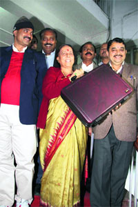 Finance Minister Indira Hriyadesh enters the Assembly to present the annual Budget in Dehradun on Thursday. 