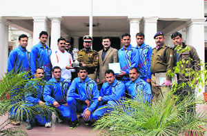 The Uttarakhand Police team that won the bronze medal in the 62nd All India Police Games held in Kerala recently, with DGP BS Sidhu in Dehradun on Thursday