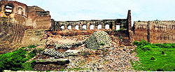 The damaged wall of the Bahu Fort in Jammu