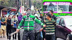 People in Poonch block the Jammu-Poonch highway to protest the Cabinet approval for new administrative units