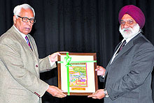 JU Vice Chancellor Prof Mohan Paul Singh Ishar felicitates Governor NN Vohra at the 101st Science Congress in Jammu on Thursday