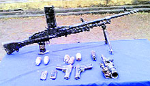 The arms and ammunition seized by the Rashtriya Rifles and Special Operations Group on Thursday