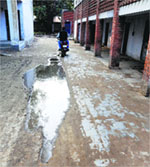 Water accumulated in front of classrooms at the government school, Bharat Nagar. Tribune photo: Himanshu Mahajan