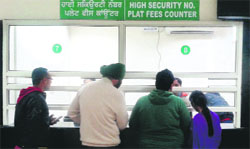 The high security registration plate counter at Suwidha Centre in the District Transport Office. a tribune photograph