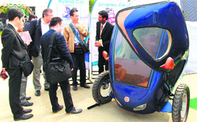 LPU students showcase a hybrid vehicle at Delhi Auto Expo-2014.