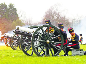Guns are fired during the Kings Troop Royal Horse Artillery 41 Royal Gun Salute to mark the accession of Britains Queen Elizabeth to the throne in 1952, at Hyde Park in London on Thursday.