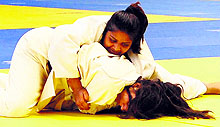 Players in action during the All-India Inter-University Judo (Women) Championship at the GNDU in Amritsar on Friday