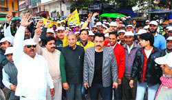 Rashtriya Krantikari Manch activists hold a protest march in Haridwar on Friday. A Tribune Photograph 