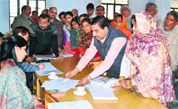 District Magistrate Nidhi Pandey attends to complaints of people at a janta darbar on the tehsil premises in Haridwar on Friday. a tribune photograph