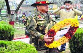 The GOC-in-C, Northern Command, pays tributes to martyrs during Nowshera Day on Friday.