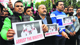 PDP workers hold protest against Minister of State for Health Shabir Ahmad Khan in Jammu on Friday.