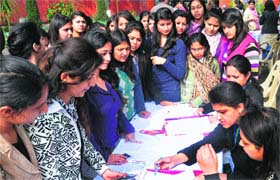 Students take part in the job fest at MCM DAV College for Women in Chandigarh on Saturday