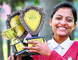 Poorva Sharma of KMV College who was declared the all-round best student with her mementoes in Jalandhar on Saturday