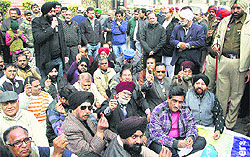 Traders show lollipops to CPS KD Bhandari in Jalandhar on Saturday