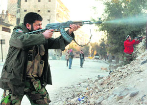 Rebels fire towards forces loyal to Syrian President Bashar al-Assad in Aleppo on Saturday. 