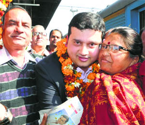 NRI Sachin Gupta with his family members at the railway station in Amritsar on Sunday