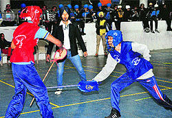 Girls in action during the PU Inter-College Gatka Tournament for Women, at Panjab University, Chandigarh, on Sunday