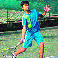 A player in action during a tennis match at Sunny Enclave, Mohali, on Sunday