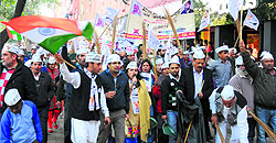 Aam Aadmi Party workers hold a rally at the Sector 17 Plaza in Chandigarh on Sunday