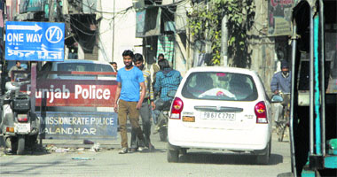 A car takes the wrong way at Jail Chowk in Jalandhar on Sunday.