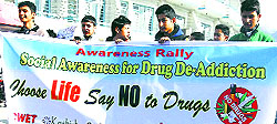 Youth participate in a rally against drug abuse in Doda