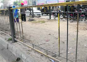 Iron grills installed under elevated roads, parts of which have gone missing in Amritsar