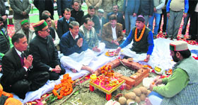 CM Harish Rawat attends puja held on the stone-laying ceremony of the Vyasi Dam at Judo village on Monday.