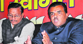 Spokesperson for the state BJP unit Suresh Joshi, along with district unit president Kuldeep Gupta, at the party office in Haridwar on Monday.