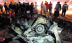 The scene after a car explosion which killed two special forces officers of the Libyan army in Benghazi, Libya