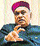 Former Chief Minister PK Dhumal talks to mediapersons in Hamirpur on Monday