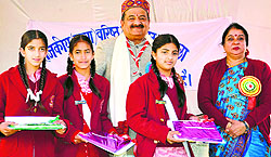 Kullu MLA Maheshwar Singh, along with Principal Poonam Sharma of Girls Senior Secondary School, Sultanpur, at the annual function in Kullu on Sunday