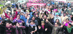 Members of the United Forum of Bank Unions protest in Jalandhar on Monday. Tribune Photo: Malkiat Singh 