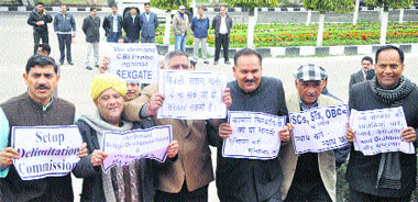 BJP legislators stage protest outside the Assembly complex in Jammu on Monday.