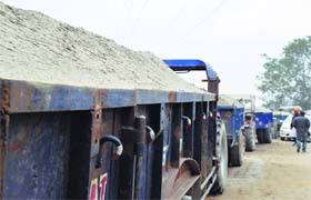 Sand-laden trailers at Hambran Road in Ludhiana. The police failed to impound the vehicles