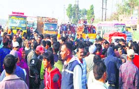 A file photo of residents blocking traffic following an accident on Tibba Road, near Jalandhar Bypass, in Ludhiana