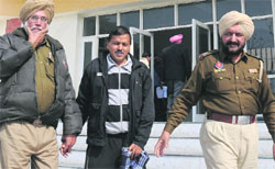 Accused Ashok Gupta in police custody at Mohali on Tuesday. Tribune Photo: Vicky Gharu