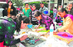 Students take part in an inter-college art fiesta, Kala Abhivyakti 2014, at MCM DAV College, Sector 36, Chandigarh, on Tuesday. Tribune photo: Parvesh Chauhan