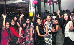 Students of the Inter National Institute of Fashion Design have a gala time at a Valentine's Day party in Sector 17, Chandigarh, on Tuesday. Tribune photo: Manoj Mahajan