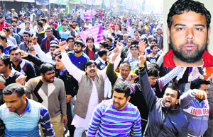 Members of the Ror community protest, demanding arrest of the accused in the Akhil Chauhan (inset) suicide case in Karnal on Tuesday.