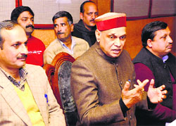 Former Chief Minister PK Dhumal addresses mediapersons in Una on Tuesday.