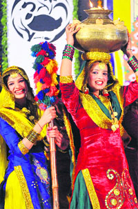 Girls of HMV College perform giddha during the annual prize distribution function in Jalandhar on Tuesday.