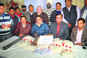 Custom officials with the seized contraband in Amritsar on Tuesday. 