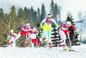Ladies huff and puff their way to the finish line during the cross-country sprint free final at the Sochi Winter Olympic Games on Tuesday