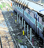 A view of an unclean track at a partially constructed platform at Amritsar railway station