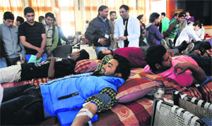 Students donate blood at Post Graduate Government College, Sector 11, Chandigarh, on Wednesday. 