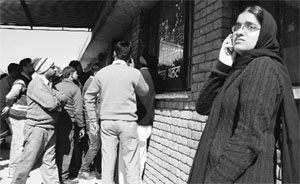 A woman waits in anguish to get a high security registration plate at Phase-VIII in Mohali on Wednesday