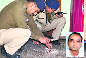 Policemen inspect the murder scene at Patel Nagar; (inset) Dharampal, who was shot dead in Dehradun on Wednesday.